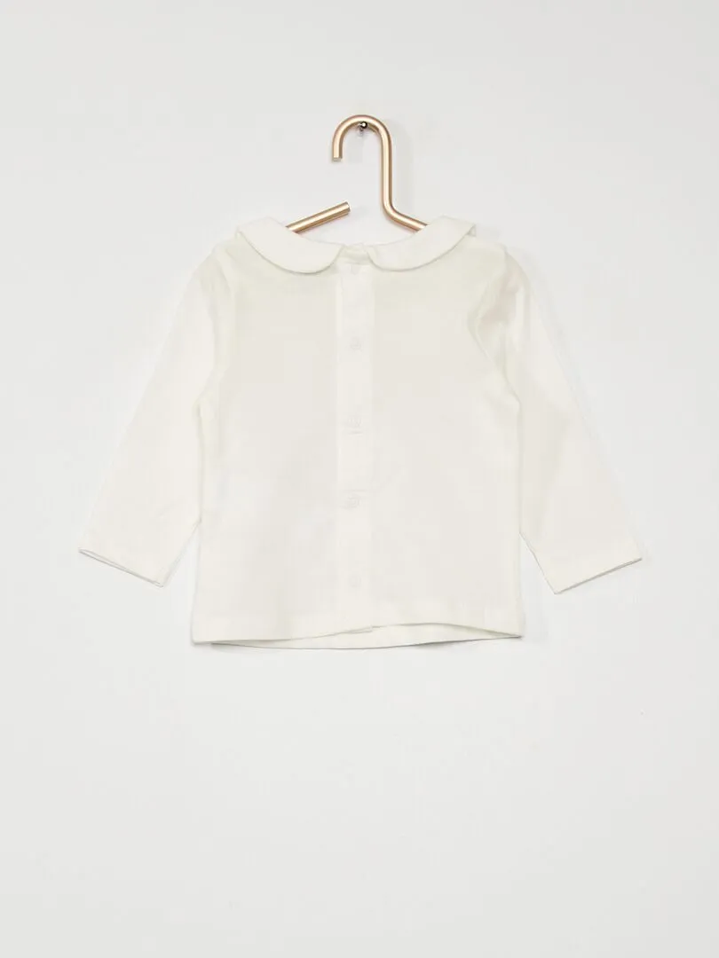 CAMISETA CON CUELLO BEBé  BLANCO