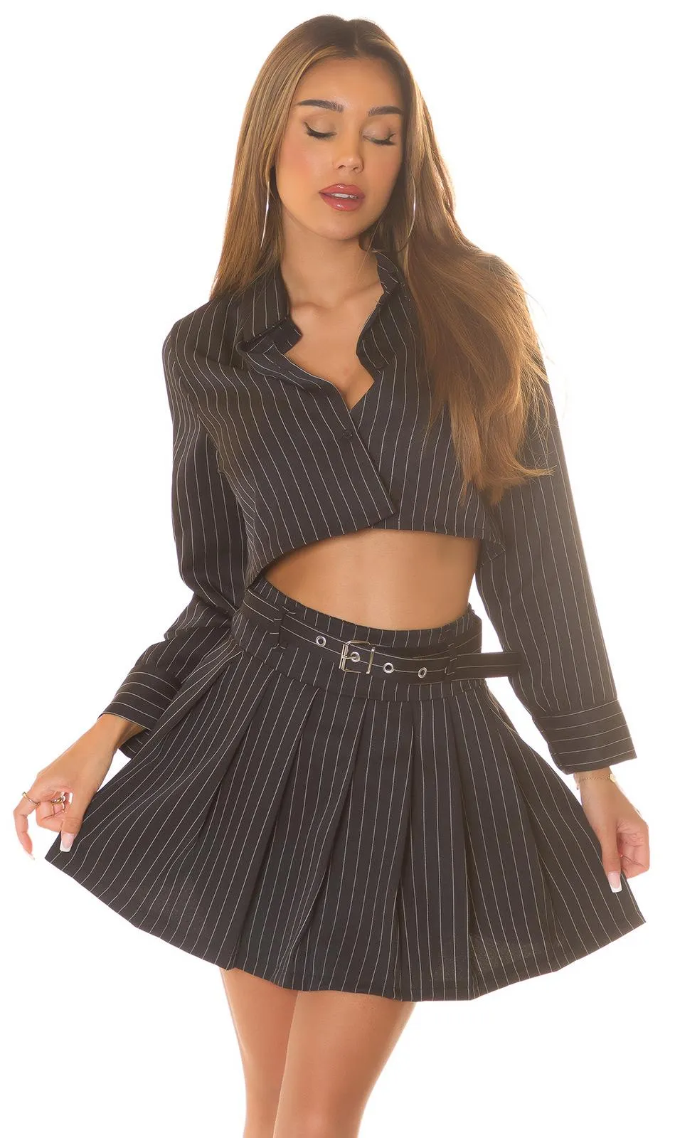 Mini falda negra elegante con pliegues