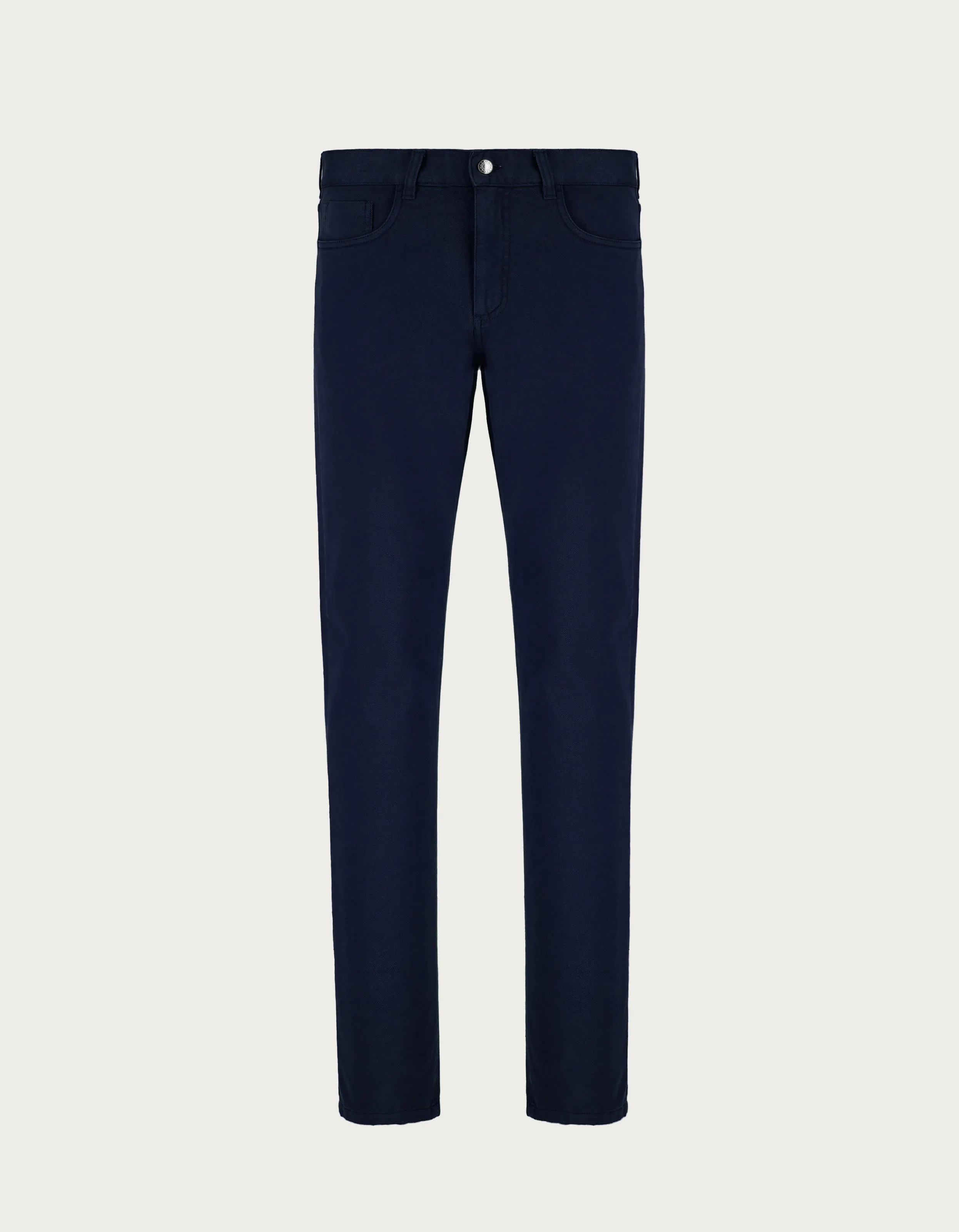 Pantalones cinco bolsillos en sarga de algodón teñido en prenda azul 