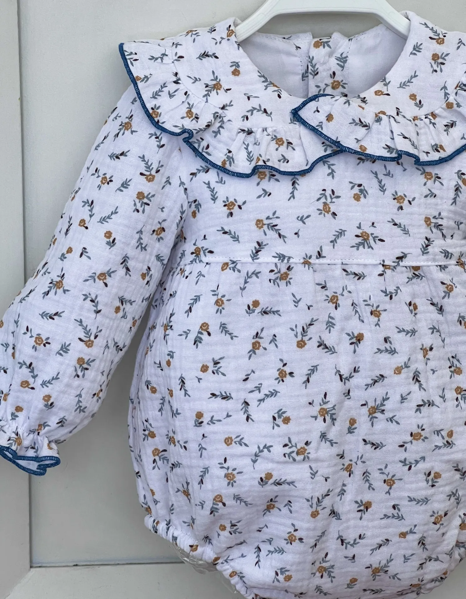 Printed muslin romper. unisex