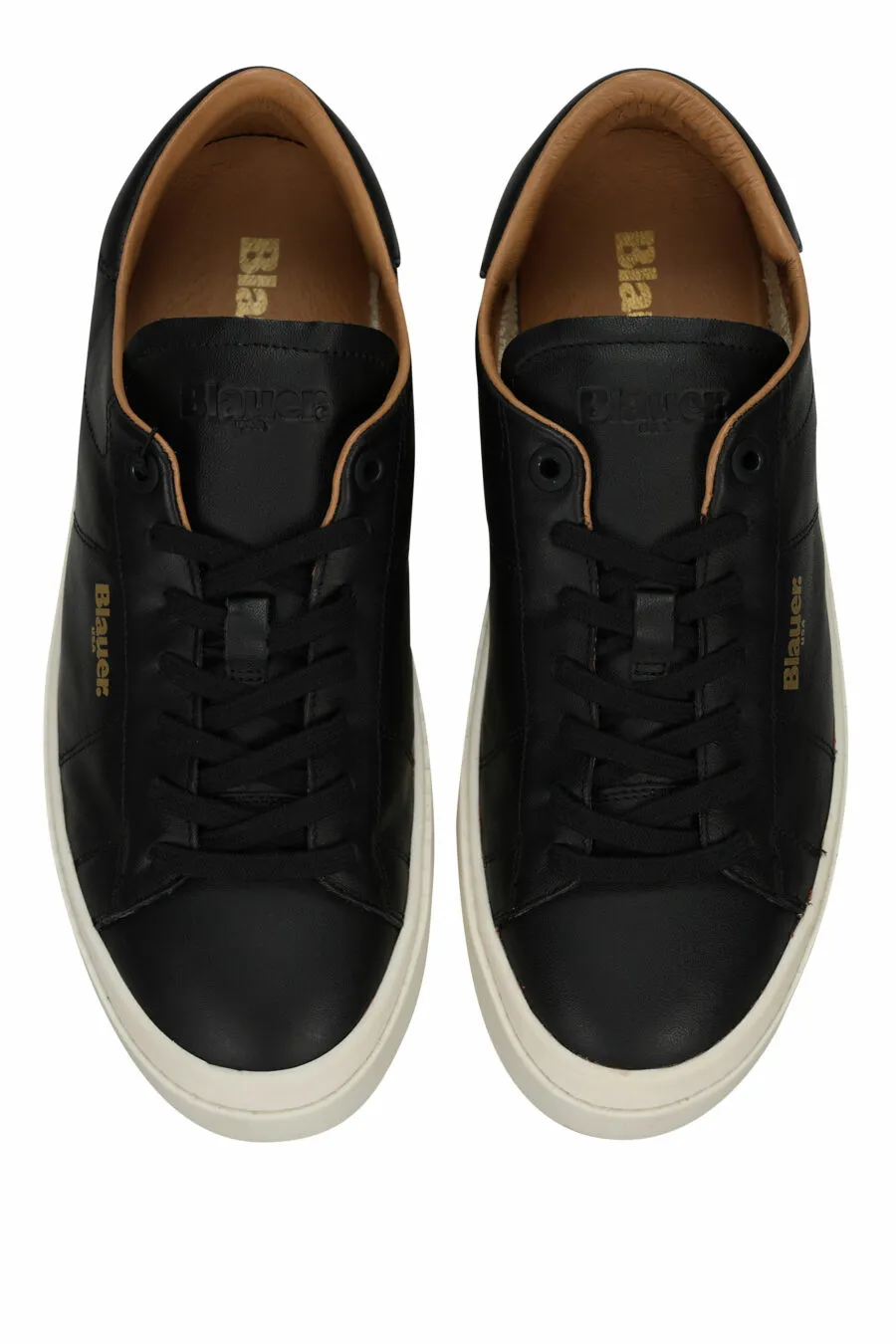Zapatillas negras de cuero con suela blanca 